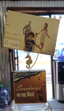 Load image into Gallery viewer, Photo Block Clip with Seahorse Charm &amp; &quot;Seashores on my mind&quot; Wood Grain
